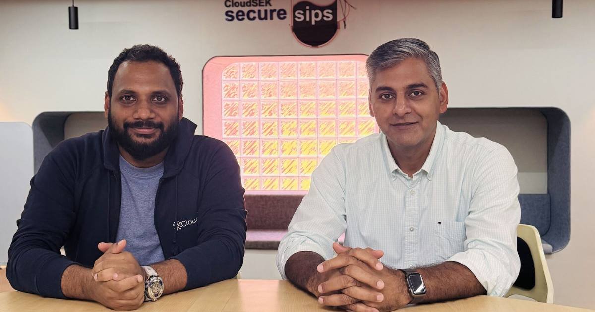 Rama Krishna Gudipati with CloudSEK CEO Rahul Sasi at CloudSEK's cafe, SecureSips, discussing future strategies for customer success and cybersecurity excellence.